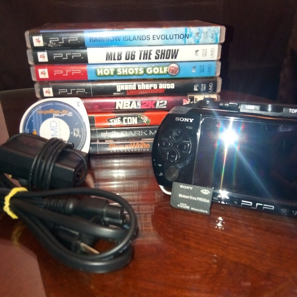 Psp with Thrustmaster with 9 games